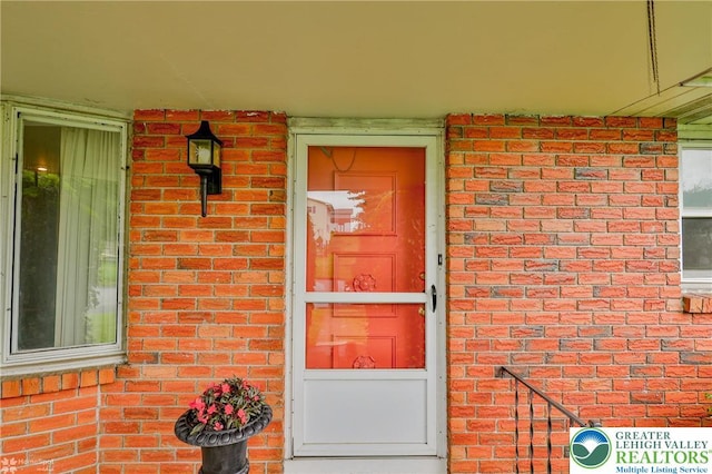 3609 Erie St, Palmer Twp, PA 18045 - property entrance featuring brick siding