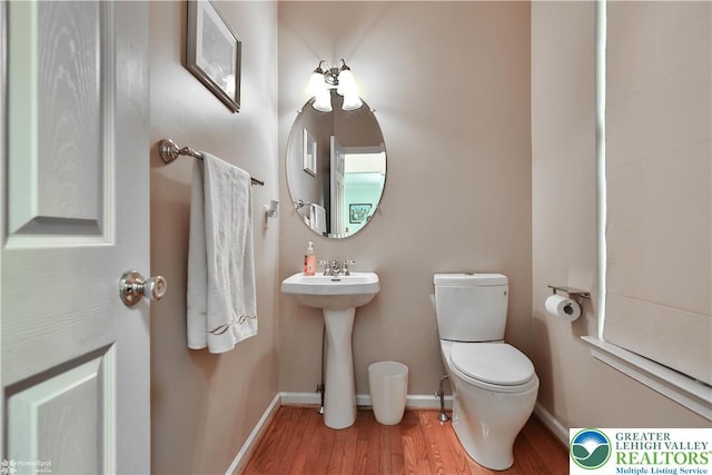 10 Windrift Ct, Easton, PA 18045 - bathroom with wood finished floors and toilet