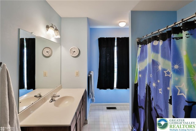 10 Windrift Ct, Easton, PA 18045 - full bath with vanity, tile patterned floors, and a shower with curtain