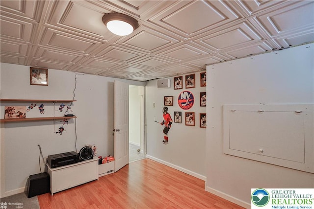 10 Windrift Ct, Easton, PA 18045 - below grade area with an ornate ceiling and light wood finished floors
