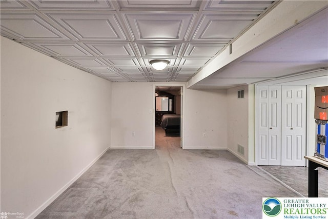 10 Windrift Ct, Easton, PA 18045 - finished basement with an ornate ceiling and carpet flooring