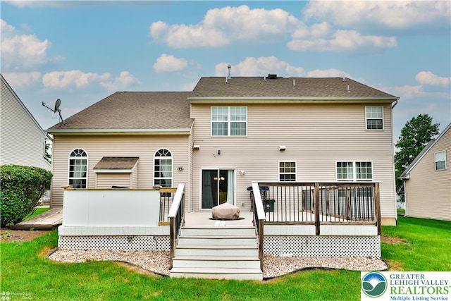 10 Windrift Ct, Easton, PA 18045 - back of property featuring a wooden deck and a lawn