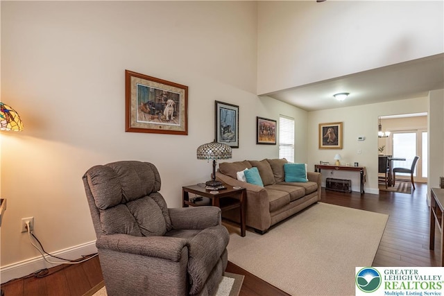 2657 Anthony Ct, Palmer Twp, PA 18045 - living area with dark wood-style flooring and a high ceiling