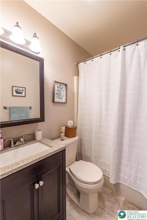 2657 Anthony Ct, Palmer Twp, PA 18045 - full bathroom with tile patterned flooring, vanity, vaulted ceiling, and shower / tub combo