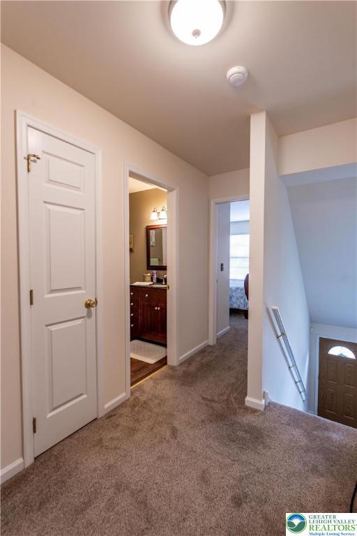 2657 Anthony Ct, Palmer Twp, PA 18045 - corridor featuring an upstairs landing and carpet flooring