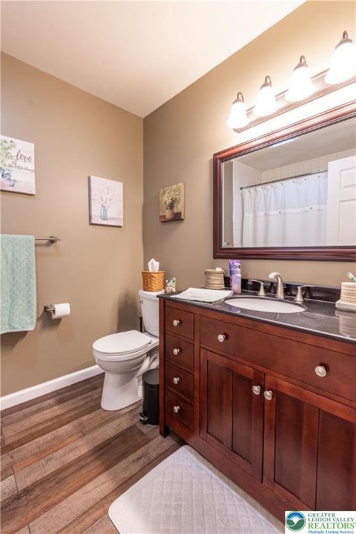 2657 Anthony Ct, Palmer Twp, PA 18045 - bathroom featuring wood finished floors and vanity