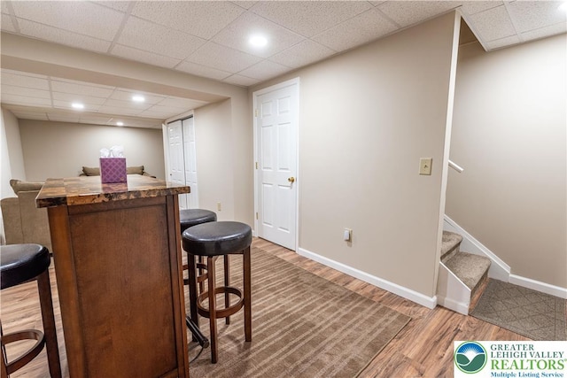 2657 Anthony Ct, Palmer Twp, PA 18045 - indoor dry bar with wood finished floors, a drop ceiling, stairs, and recessed lighting