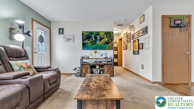 3954 Cedar Dr, Lehigh Twp, PA 18088 - living area featuring light colored carpet and healthy amount of natural light