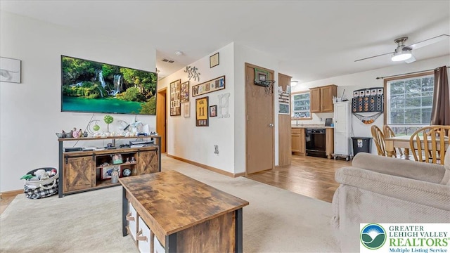 3954 Cedar Dr, Lehigh Twp, PA 18088 - living area featuring light colored carpet and a ceiling fan