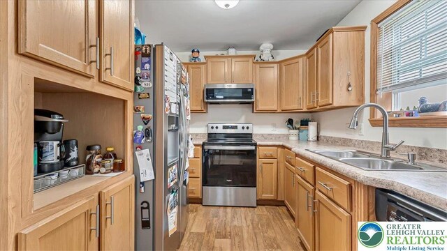 3954 Cedar Dr, Lehigh Twp, PA 18088 - kitchen with appliances with stainless steel finishes, light countertops, light wood-type flooring, and light brown cabinetry