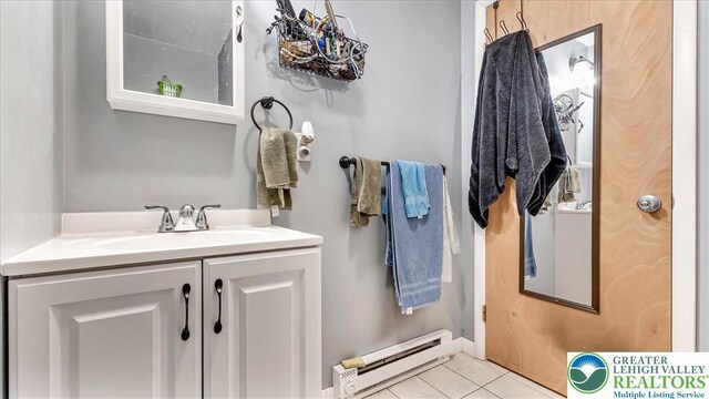 3954 Cedar Dr, Lehigh Twp, PA 18088 - bathroom with a baseboard radiator, tile patterned flooring, and vanity