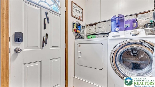 3954 Cedar Dr, Lehigh Twp, PA 18088 - laundry room featuring separate washer and dryer and cabinet space