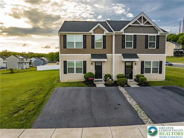 403 Lock Dr, Allen Twp, PA 18067 - townhome / multi-family property with a front lawn and roof with shingles