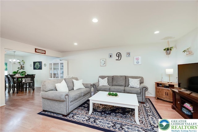 1778 Pinewind Dr, Alburtis Boro, PA 18011 - living room featuring light wood-type flooring, a chandelier, and recessed lighting