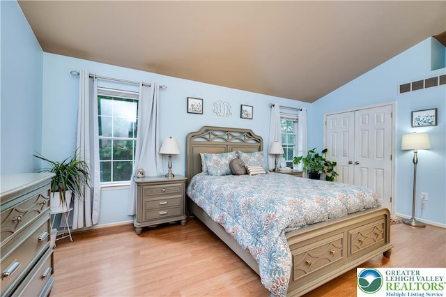 1778 Pinewind Dr, Alburtis Boro, PA 18011 - bedroom featuring light wood finished floors, lofted ceiling, and a closet