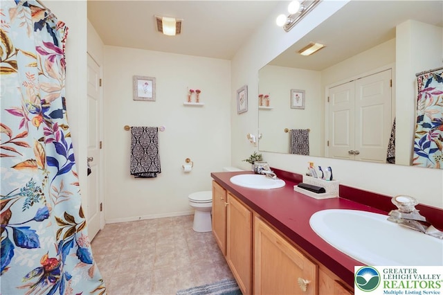 1778 Pinewind Dr, Alburtis Boro, PA 18011 - bathroom featuring double vanity and toilet