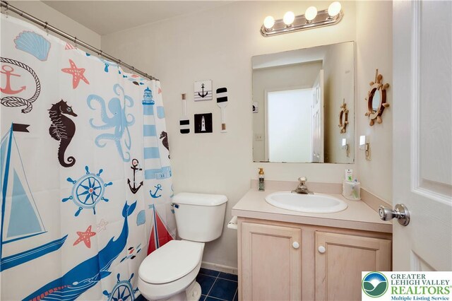 1778 Pinewind Dr, Alburtis Boro, PA 18011 - bathroom featuring vanity, tile patterned floors, and a shower with shower curtain