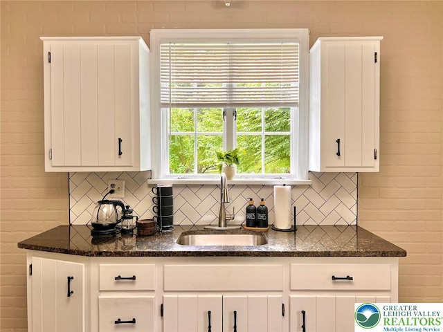 737 Frost Hollow Rd, Easton, PA 18040 - kitchen featuring backsplash, white cabinetry, and dark stone countertops