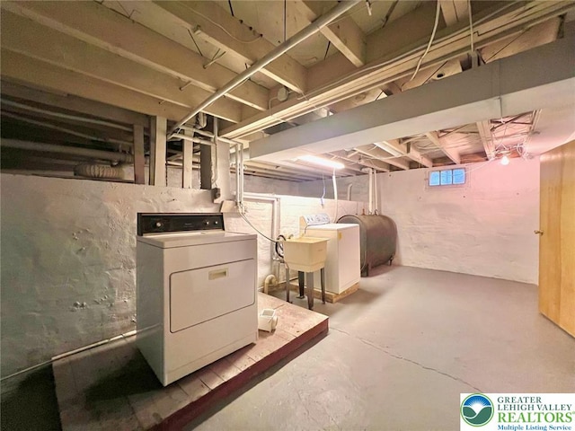 737 Frost Hollow Rd, Easton, PA 18040 - below grade area with washer and dryer and heating fuel