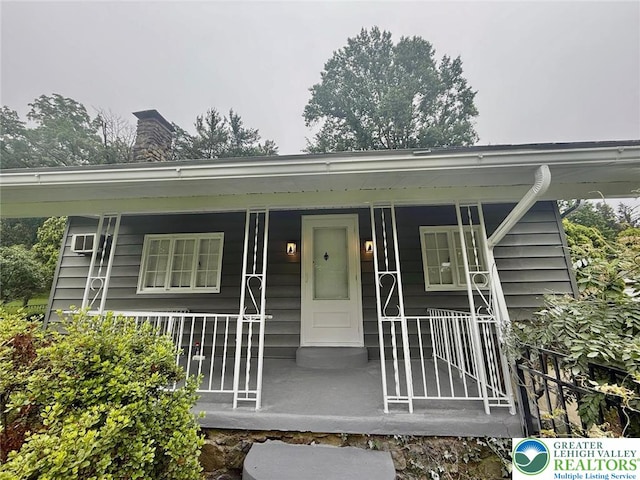 737 Frost Hollow Rd, Easton, PA 18040 - view of front facade featuring a porch and a chimney