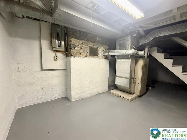737 Frost Hollow Rd, Easton, PA 18040 - unfinished below grade area featuring electric panel, heating unit, and stairway