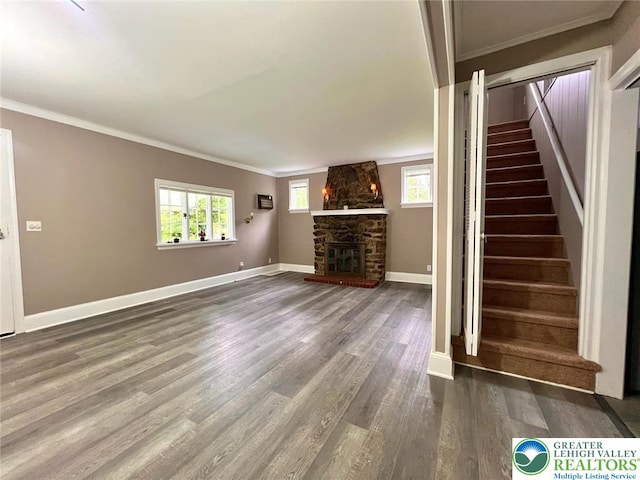 737 Frost Hollow Rd, Easton, PA 18040 - unfurnished living room with stairway, wood finished floors, ornamental molding, and a stone fireplace