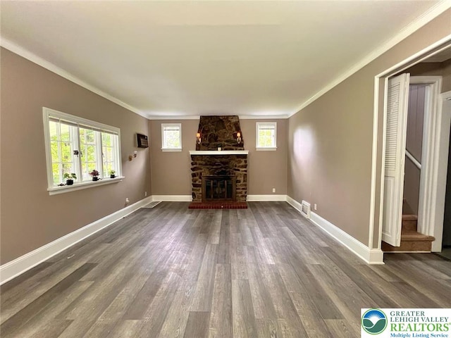 737 Frost Hollow Rd, Easton, PA 18040 - unfurnished living room with crown molding, dark wood-style floors, a fireplace, and stairs