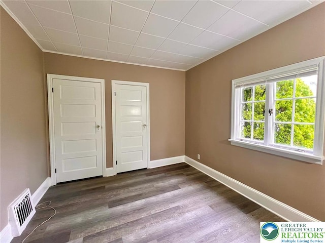 737 Frost Hollow Rd, Easton, PA 18040 - unfurnished room with dark wood-type flooring and ornamental molding