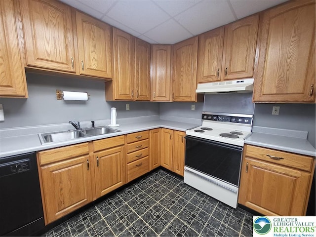 419 E Walnut St, Allentown City, PA 18109 - kitchen featuring dishwasher, white range with electric cooktop, under cabinet range hood, light countertops, and dark floors