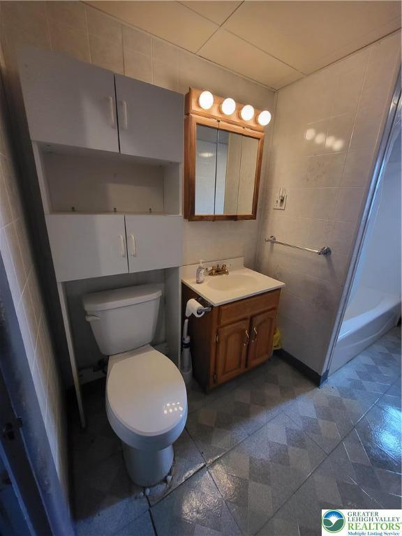 419 E Walnut St, Allentown City, PA 18109 - bathroom with vanity and a shower