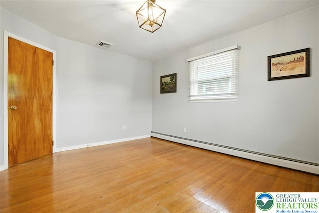 627 Columbia Ave, Palmerton Boro, PA 18071 - unfurnished room with baseboard heating and wood finished floors