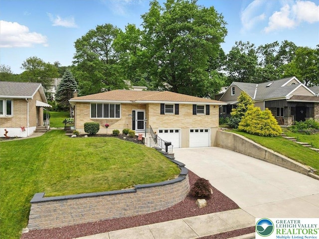 627 Columbia Ave, Palmerton Boro, PA 18071 - view of front of home with driveway, a garage, and a front yard