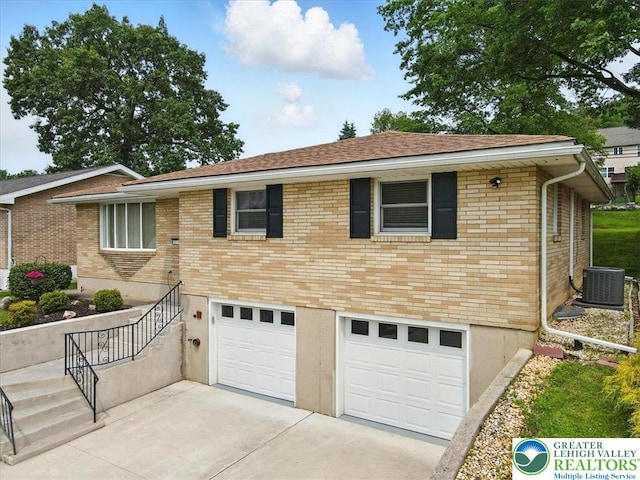 627 Columbia Ave, Palmerton Boro, PA 18071 - view of front of home with an attached garage, driveway, and brick siding
