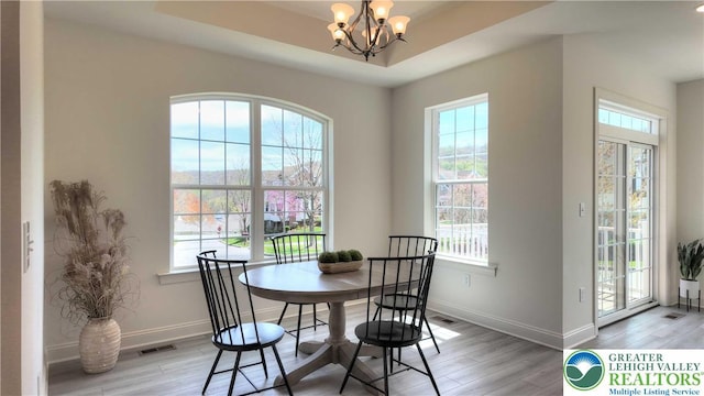 868 Veneto Ct, Forks Twp, PA 18040 - dining room with plenty of natural light and light wood-style flooring