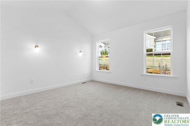 868 Veneto Ct, Forks Twp, PA 18040 - carpeted empty room featuring lofted ceiling and baseboards
