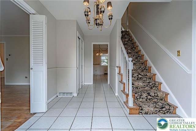 1265 Clearview Cir, Lower Macungie Twp, PA 18103 - foyer with a chandelier, stairs, and light tile patterned floors