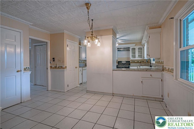 1265 Clearview Cir, Lower Macungie Twp, PA 18103 - kitchen with ornamental molding, white cabinets, a chandelier, range, and light countertops