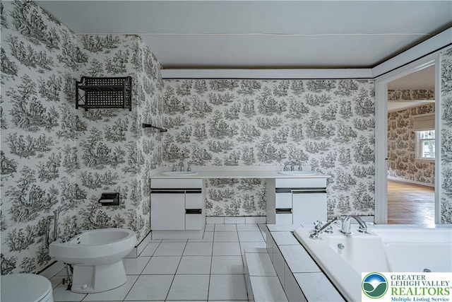 1265 Clearview Cir, Lower Macungie Twp, PA 18103 - full bath with wallpapered walls, a bidet, vanity, a bath, and tile patterned flooring
