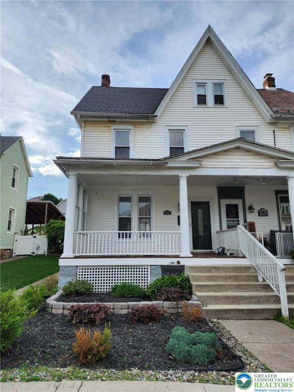 233 Lafayette Ave, Palmerton Boro, PA 18071 - view of front of property featuring covered porch and a chimney
