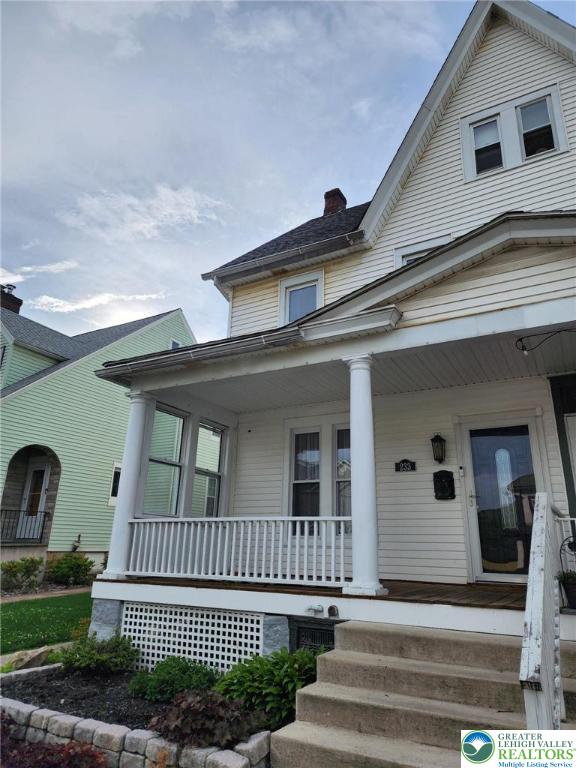 233 Lafayette Ave, Palmerton Boro, PA 18071 - view of front of house with a porch and a chimney