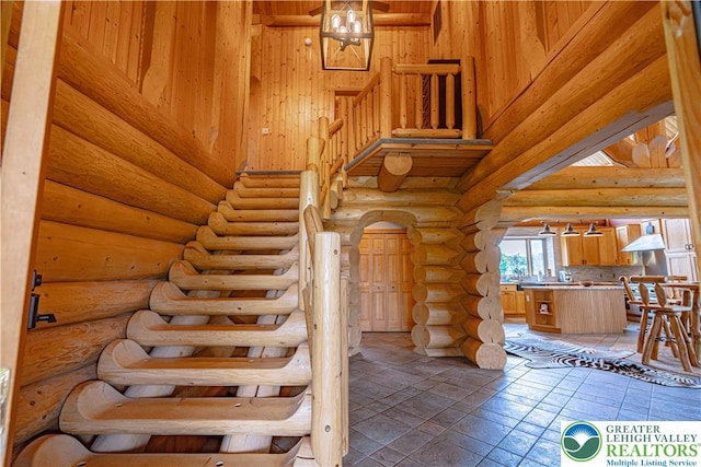 379 Meyer Rd, Bushkill Twp, PA 18064 - stairs with arched walkways and log walls