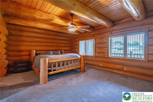 379 Meyer Rd, Bushkill Twp, PA 18064 - bedroom with a wooden ceiling with exposed beams, carpet, and rustic walls