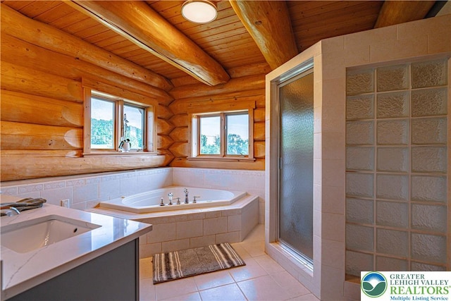 379 Meyer Rd, Bushkill Twp, PA 18064 - bathroom featuring a wooden ceiling with exposed beams, tile patterned floors, a bath, vanity, and a stall shower