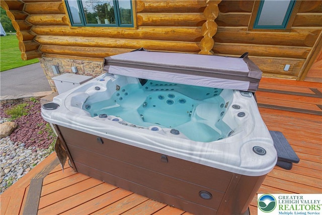 379 Meyer Rd, Bushkill Twp, PA 18064 - exterior view of log siding and a hot tub