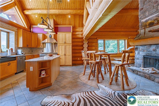379 Meyer Rd, Bushkill Twp, PA 18064 - kitchen featuring a wooden ceiling with exposed beams, stainless steel dishwasher, healthy amount of natural light, rustic walls, and a kitchen island