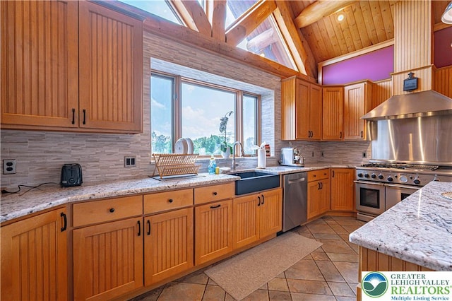 379 Meyer Rd, Bushkill Twp, PA 18064 - kitchen with appliances with stainless steel finishes, tasteful backsplash, wall chimney exhaust hood, light tile patterned flooring, and wood ceiling