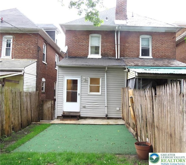 2206 Forest St, Wilson Boro, PA 18042 - rear view of property featuring entry steps and a chimney