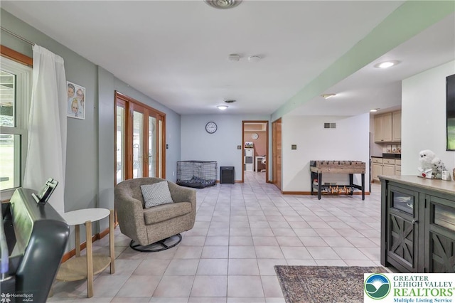 1925 Peach Tree Ln, Lower Saucon Twp, PA 18015 - living room featuring french doors and light tile patterned floors