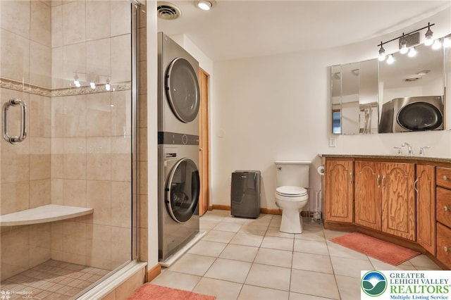 1925 Peach Tree Ln, Lower Saucon Twp, PA 18015 - full bathroom featuring stacked washer / drying machine, tile patterned flooring, a shower stall, and vanity