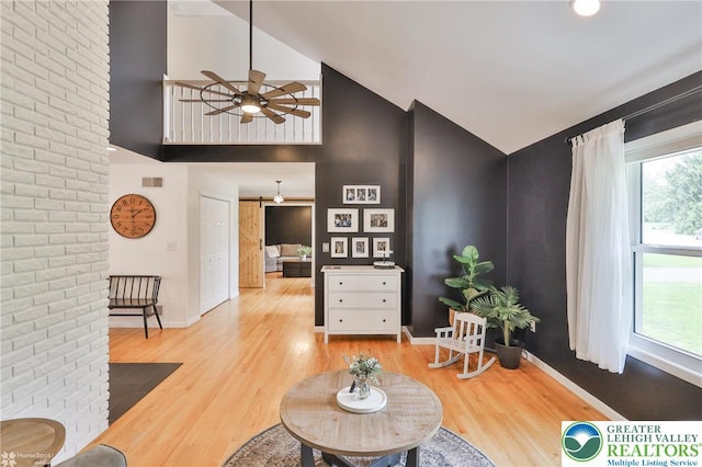 1925 Peach Tree Ln, Lower Saucon Twp, PA 18015 - living room with wood finished floors, high vaulted ceiling, and ceiling fan